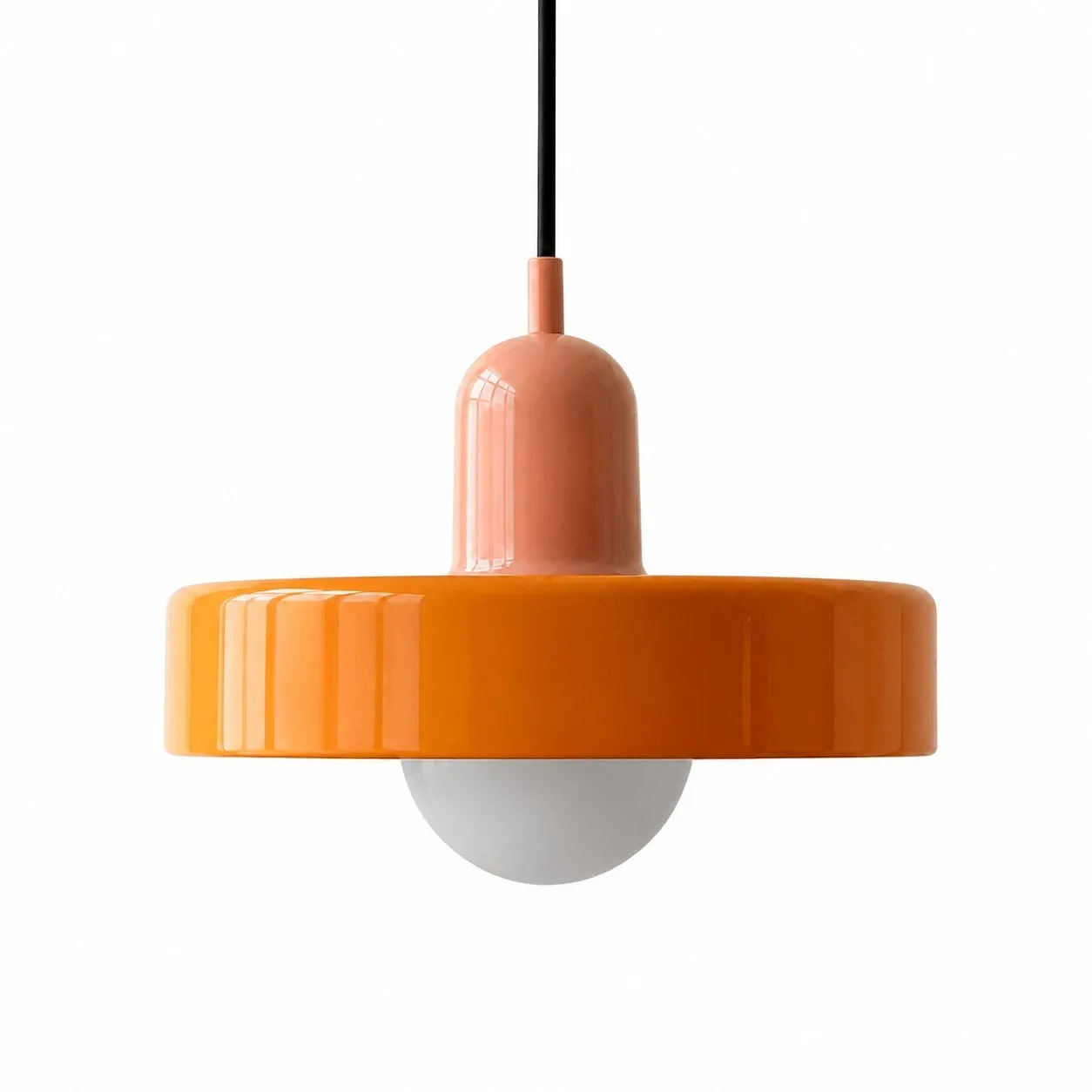 Pink surface with yellow glass shade