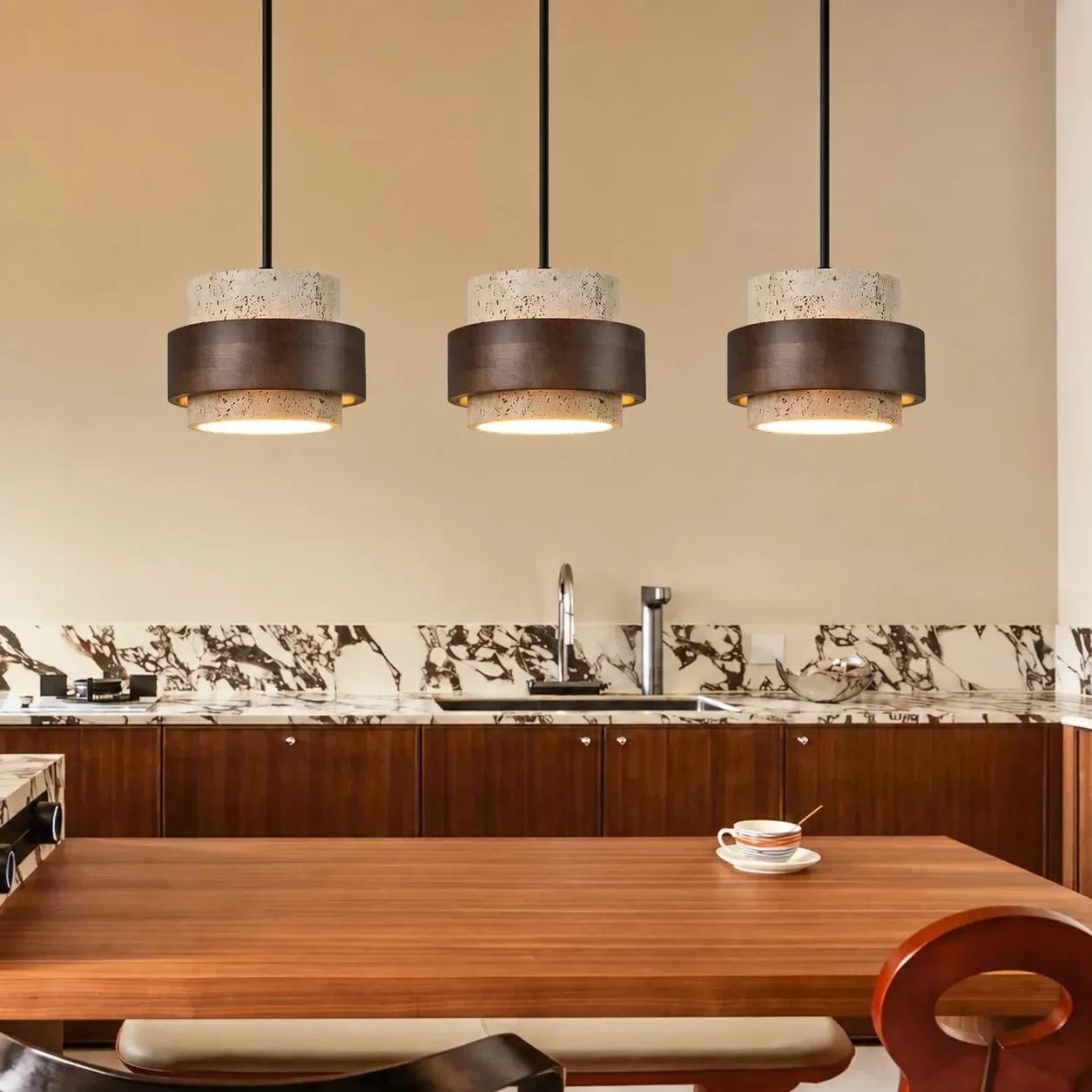 Three-light arrangement over a dining table